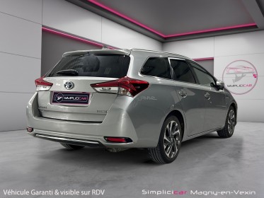 Toyota auris touring sports pro rc18 hybride pro 136h design business occasion simplicicar magny-en-vexin simplicicar...