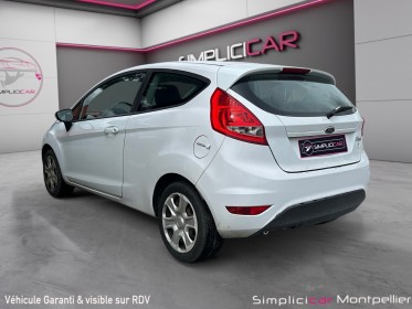 Ford fiesta 1.25 60 ch climatisation roue de secours garantie 12 mois occasion montpellier (34) simplicicar simplicibike france
