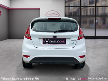 Ford fiesta 1.25 60 ch climatisation roue de secours garantie 12 mois occasion montpellier (34) simplicicar simplicibike france