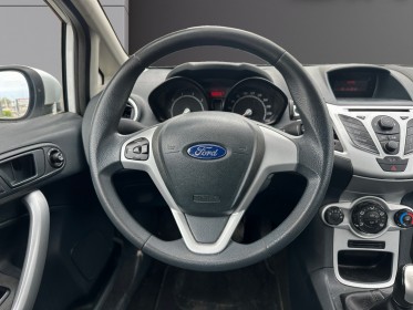 Ford fiesta 1.25 60 ch climatisation roue de secours garantie 12 mois occasion montpellier (34) simplicicar simplicibike france