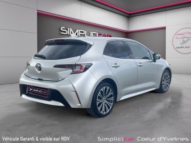 Toyota corolla hybride 122h design occasion simplicicar coeur d'yvelines - auto expo 78 simplicicar simplicibike france