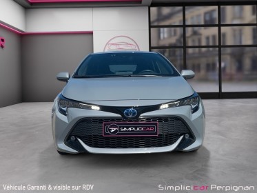 Toyota corolla hybride my22 122 ch dynamic caméra/démarrage sans clefs garantie constructeur occasion simplicicar perpignan...