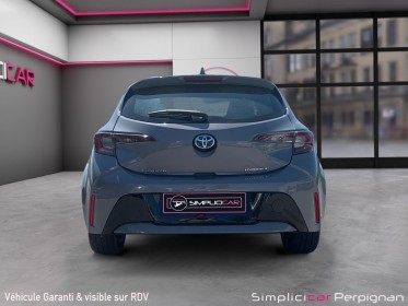 Toyota corolla hybride my22 122 ch dynamic caméra/démarrage sans clefs garantie constructeur occasion simplicicar perpignan...