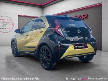 Toyota aygo x 1.0 vvt-i 72 s-cvt air design toit ouvrant carplay boite auto garantie 12 mois occasion montpellier (34)...