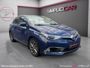 Toyota auris hybride 136 ch lounge toit panoramique, sièges chauffants, full entretien toyota, garantie 12 mois occasion...