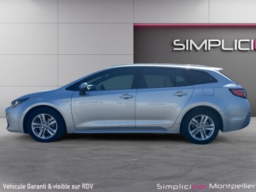 Toyota corolla touring sports hybride pro my20 pro hybride 122h dynamic business/ 12 mois garantie occasion montpellier (34)...