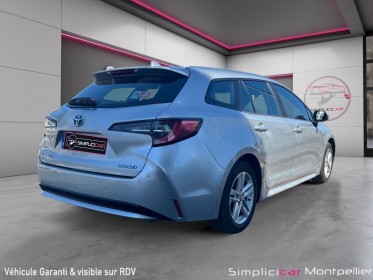 Toyota corolla touring sports hybride pro my20 pro hybride 122h dynamic business/ 12 mois garantie occasion montpellier (34)...
