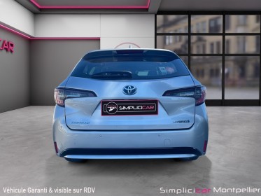 Toyota corolla touring sports hybride pro my20 pro hybride 122h dynamic business/ 12 mois garantie occasion montpellier (34)...