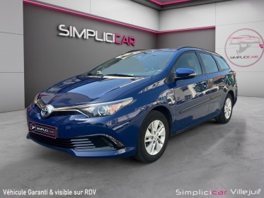 Toyota auris touring sports pro rc18 hybride pro 136h design, garantie 12 mois, gps garantie constructeur, entretiens toyota...