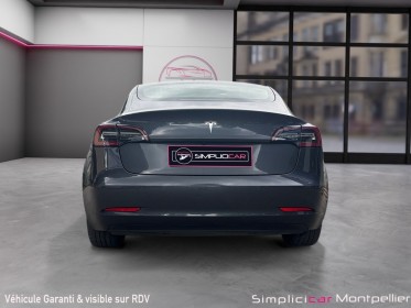 Tesla model 3 autonomie standard plus rwd, volant chauffant, sièges chauffants, toit panoramique, garantie 12 mois occasion...