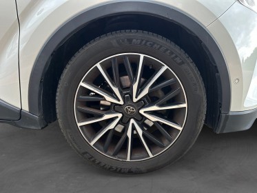 Toyota c-hr hybride 122ch distinctive 1er main suivi toyota complet caméra cuir chauffant garantie constructeur 2 ans...