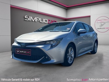 Toyota corolla touring sports hybride pro my20 pro hybride 122h dynamic business/ 12 mois garantie occasion montpellier (34)...