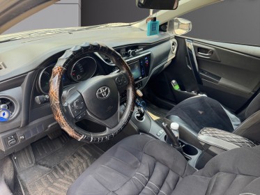 Toyota auris touring sports business hybride 136h dynamic business occasion paris 17ème (75)(porte maillot) simplicicar...
