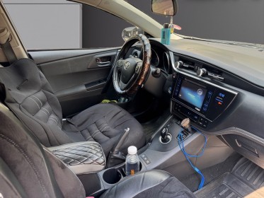 Toyota auris touring sports business hybride 136h dynamic business occasion paris 17ème (75)(porte maillot) simplicicar...