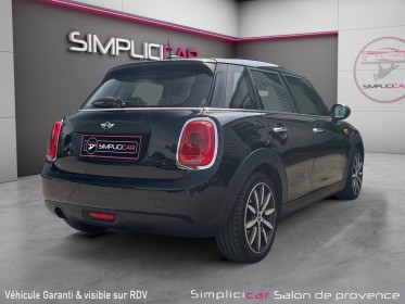 Mini hatch 5 portes one d 95 ch / double toit panoramique ouvrant / entretiens mini / garantie occasion simplicicar salon de...