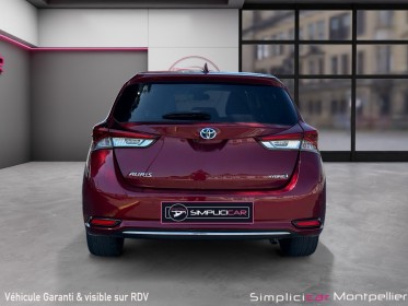 Toyota auris hybride 136h design caméra de recul sièges chauffants kit main libre garantie 12 mois occasion montpellier...