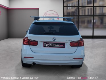 Bmw serie 3 touring f31 318d 143 ch 123 g business a - garantie 12 mois occasion simplicicar brest simplicicar simplicibike...
