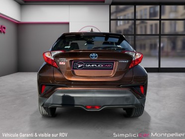 Toyota c-hr hybride 122h dynamic camera de recul suivi toyota garantie 2027 occasion montpellier (34) simplicicar...
