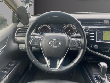 Toyota camry hybride my21 218ch 2wd dynamic cuir pack confort occasion simplicicar coeur d'yvelines - auto expo 78...