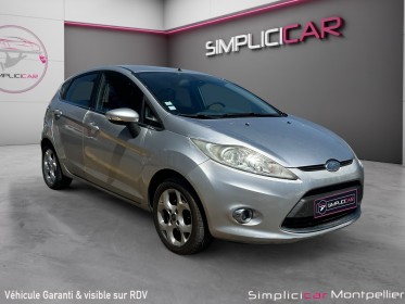 Ford fiesta 1.4 tdci 68 ambiente climatisation bluetooth 5 portes garantie 12 mois occasion montpellier (34) simplicicar...