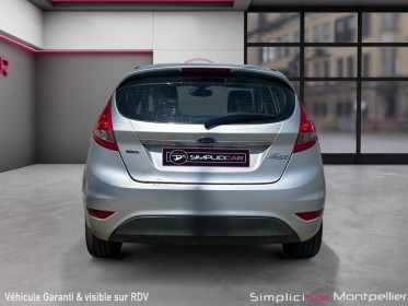 Ford fiesta 1.4 tdci 68 ambiente climatisation bluetooth 5 portes garantie 12 mois occasion montpellier (34) simplicicar...