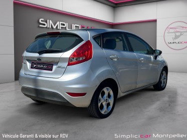 Ford fiesta 1.4 tdci 68 ambiente climatisation bluetooth 5 portes garantie 12 mois occasion montpellier (34) simplicicar...