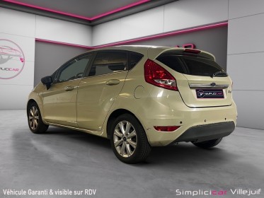 Ford fiesta 1.25 82 ghia, radar de recul, garantie 12 mois occasion simplicicar villejuif  simplicicar simplicibike france