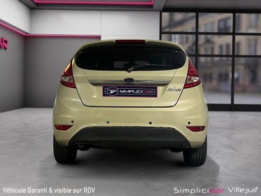 Ford fiesta 1.25 82 ghia, radar de recul, garantie 12 mois occasion simplicicar villejuif  simplicicar simplicibike france