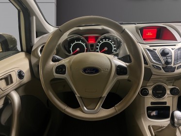 Ford fiesta 1.25 82 ghia, radar de recul, garantie 12 mois occasion simplicicar villejuif  simplicicar simplicibike france