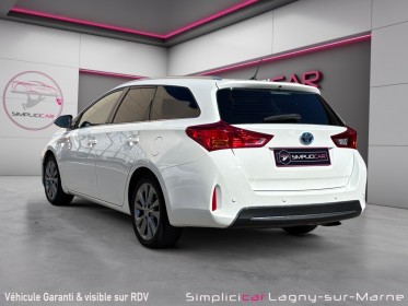 Toyota auris touring sports 1.8 vvt-i hybride 136h executive occasion simplicicar lagny  simplicicar simplicibike france