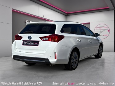 Toyota auris touring sports 1.8 vvt-i hybride 136h executive occasion simplicicar lagny  simplicicar simplicibike france