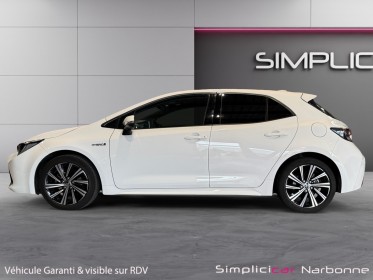 Toyota corolla hybride my21 122h design camera clim carplay garantie 12 mois occasion simplicicar narbonne simplicicar...