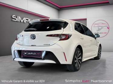 Toyota corolla hybride my21 122h design camera clim carplay garantie 12 mois occasion simplicicar narbonne simplicicar...