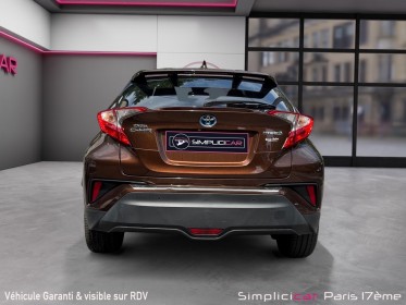 Toyota c-hr 1..8 vvt-i hybrid 122 distinctive/ camera de recul/ park assist/garantie 12 mois occasion paris 17ème (75)(porte...