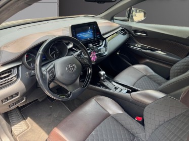 Toyota c-hr 1..8 vvt-i hybrid 122 distinctive/ camera de recul/ park assist/garantie 12 mois occasion paris 17ème (75)(porte...