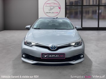Toyota auris hybride 136h executive, garantie 12mois toit panoramique, siège chauffants, suivie toyota occasion simplicicar...