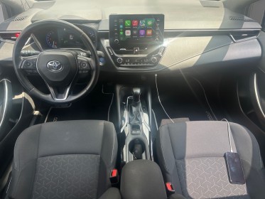 Toyota corolla hybride 122h dynamic, garantie 12 mois, caméra de recul, carplay, entretient toyota, park assist occasion...