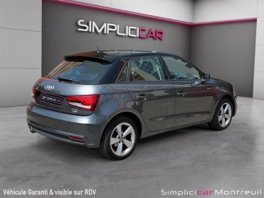 Audi a1 sportback 1.0 tfsi ultra 95 s tronic 7 ambiente/garantie 12 mois/toit ouvrant pano/bluetooth/entretien complet...