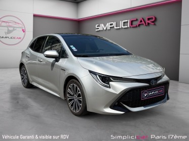 Toyota corolla hybride my20 122h design/toit ouvrant/apple carplay/garantie 12 mois occasion paris 17ème (75)(porte maillot)...