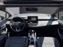 Toyota corolla hybride my20 122h design/toit ouvrant/apple carplay/garantie 12 mois occasion paris 17ème (75)(porte maillot)...