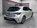 Toyota corolla hybride my20 122h design/toit ouvrant/apple carplay/garantie 12 mois occasion paris 17ème (75)(porte maillot)...