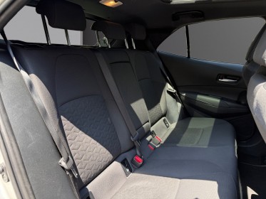 Toyota corolla hybride my20 122h design/toit ouvrant/apple carplay/garantie 12 mois occasion paris 17ème (75)(porte maillot)...
