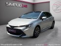 Toyota corolla hybride my20 122h design/toit ouvrant/apple carplay/garantie 12 mois occasion paris 17ème (75)(porte maillot)...