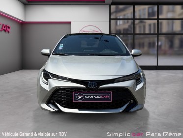 Toyota corolla hybride my20 122h design/toit ouvrant/apple carplay/garantie 12 mois occasion paris 17ème (75)(porte maillot)...