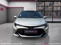 Toyota corolla hybride my20 122h design/toit ouvrant/apple carplay/garantie 12 mois occasion paris 17ème (75)(porte maillot)...