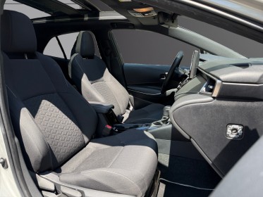 Toyota corolla hybride my20 122h design/toit ouvrant/apple carplay/garantie 12 mois occasion paris 17ème (75)(porte maillot)...