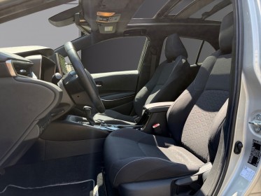 Toyota corolla hybride my20 122h design/toit ouvrant/apple carplay/garantie 12 mois occasion paris 17ème (75)(porte maillot)...