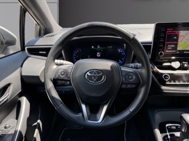 Toyota corolla hybride my20 122h design/toit ouvrant/apple carplay/garantie 12 mois occasion paris 17ème (75)(porte maillot)...