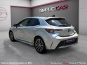 Toyota corolla hybride my20 122h design/toit ouvrant/apple carplay/garantie 12 mois occasion paris 17ème (75)(porte maillot)...