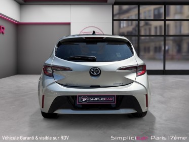 Toyota corolla hybride my20 122h design/toit ouvrant/apple carplay/garantie 12 mois occasion paris 17ème (75)(porte maillot)...